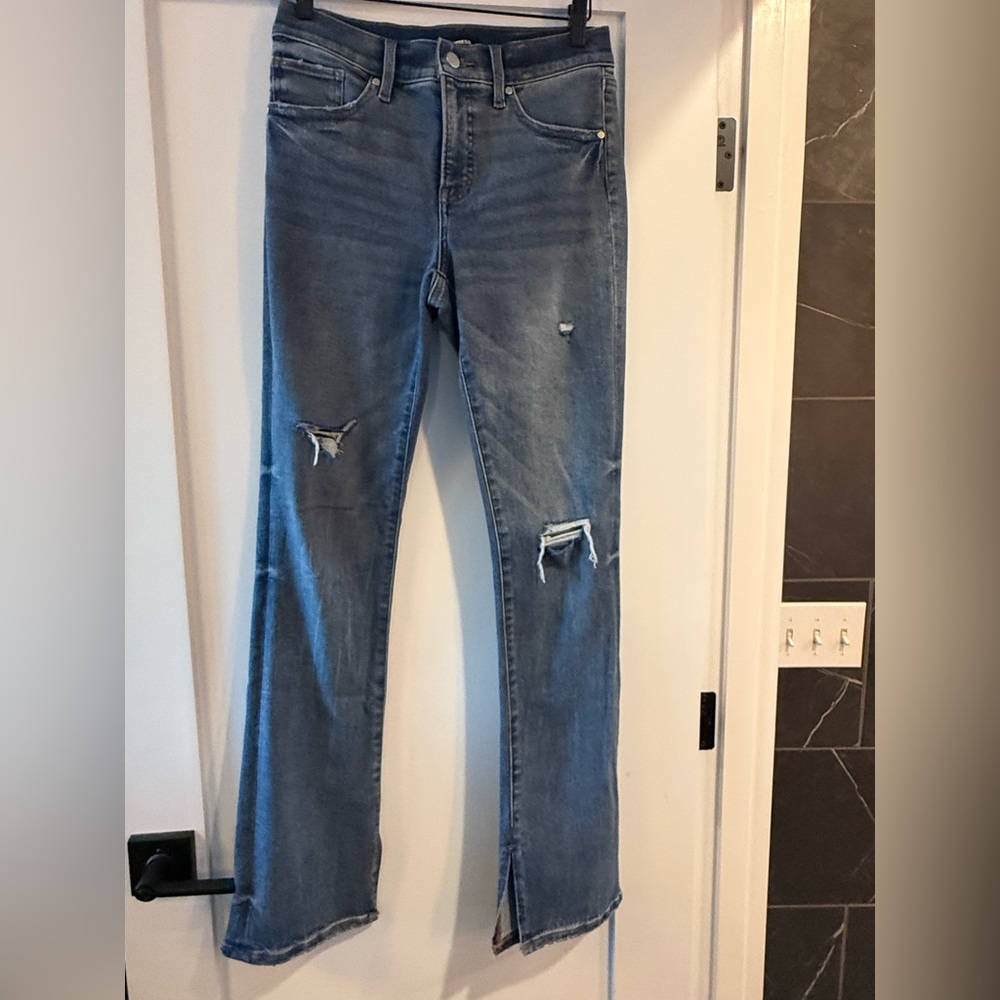 Distressed Blue Jeans
